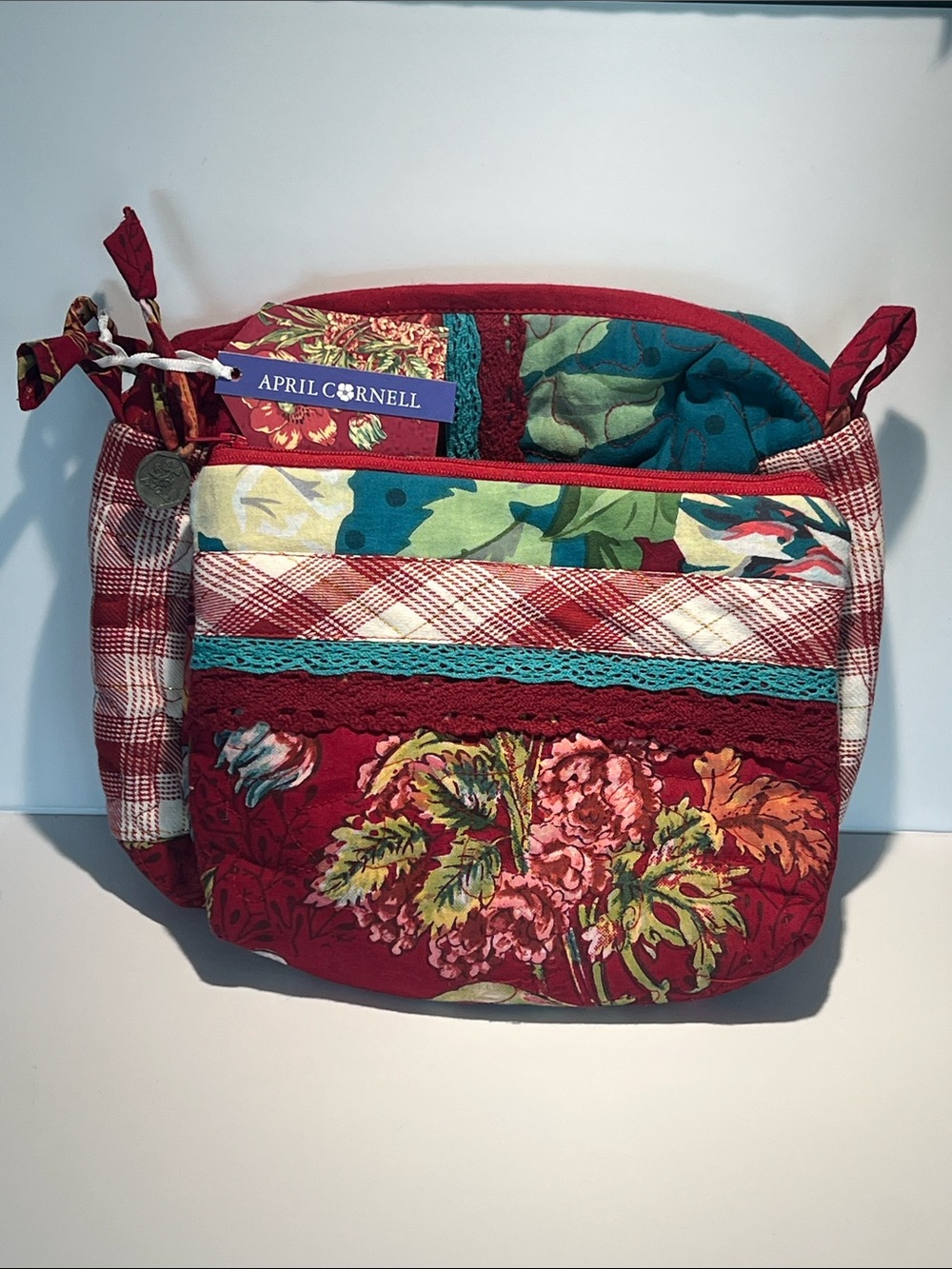 April Cornell Red Floral Quilted Cosmetic Crossbody with Teal Accents